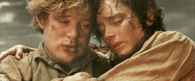 Sam picking up Frodo to try and make it to the pyre