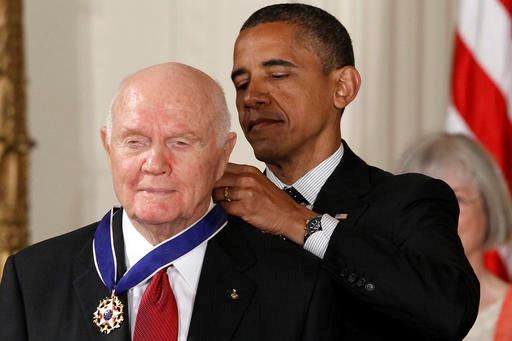 In this Tuesday, May 29, 2012, file photo, President Barack Obama awards the Medal of Freedom to former astronaut John Glenn during a ceremony in the East Room of the White House in Washington. Glenn, the first American to orbit Earth who later spent 24 years representing Ohio in the Senate, died Thursday, Dec. 8, 2016, at the age of 95. (AP Photo/Charles Dharapak, File)