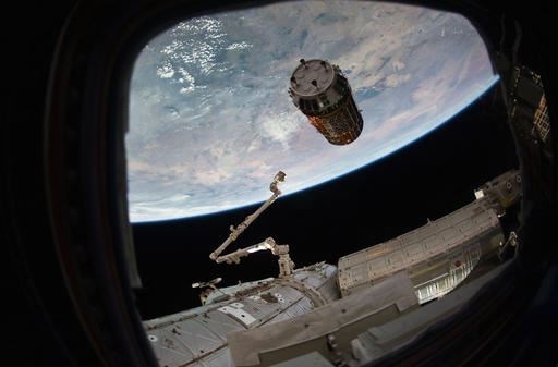 This photo provided by NASA TV shows a Japanese cargo ship before it arrives with Christmas gifts to the International Space Station on Tuesday, Dec. 13, 2016. The capsule — called Kounotori, or white stork — contains nearly 5 tons of food, water, batteries and other supplies. NASA said there also are Christmas presents for the two Americans, three Russians and one Frenchman on board. (NASA TV via AP)