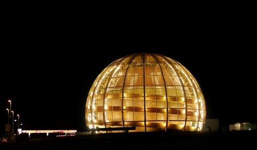 In this March 30, 2010 file picture the globe of the European Organization for Nuclear Research, CERN, is illuminated outside Geneva, Switzerland. (AP Photo/Anja Niedringhaus, file)