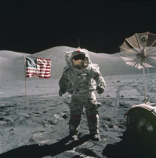 In this Dec. 12, 1972, photo provided by NASA, Apollo 17 commander Eugene Cernan stands on the moon. NASA announced that former astronaut Cernan, the last man to walk on the moon, died Monday, Jan. 16, 2017, surrounded by his family. He was 82. (NASA via AP)