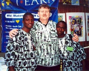 Rashid Peters with his hero, Bill Belsey, and Andrew Greene at the iEARN Conference in Cape Town, South Africa (Courtesy of  www.childsoldiers.org)