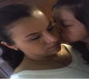 Me kissing my mom<br>(We took this picture on Mother's Day at Cuernavaca.)