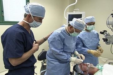 Dr. Holland operating on Todd (abc.com)