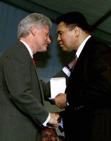 Muhammad Ali recieving a medal from Bill Clinton (http://www.citizensmedal.com/MuhammadAli_BillClinton.jpg)