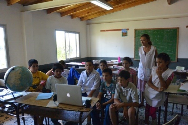Anusia with students watching Biblioburro short documentary from The MY HERO Project (Photo by Annie Merkley)