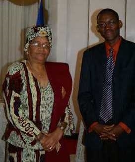 With Liberian President Sirleaf.