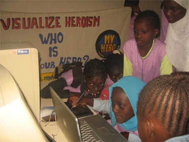 Cheikh Seck's students using a Wacom Pad to create digital art for MY HERO