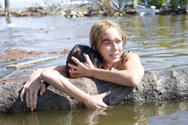 Tom Holland, left, and Naomi Watts in a scene from 'The Impossible.' In January Watts was nominated for an Academy Award for best actress for her role in the film. Mike Rea, founder of Give2Asia, has tied his efforts to provide effective aid to tsunami victims to the release of the film.  <P>Jose Haro/AP/Summit Entertainment