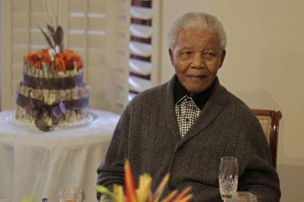 Former South African president Nelson Mandela in a file photo from July 2012. He has been hospitalized. <P>AP/File