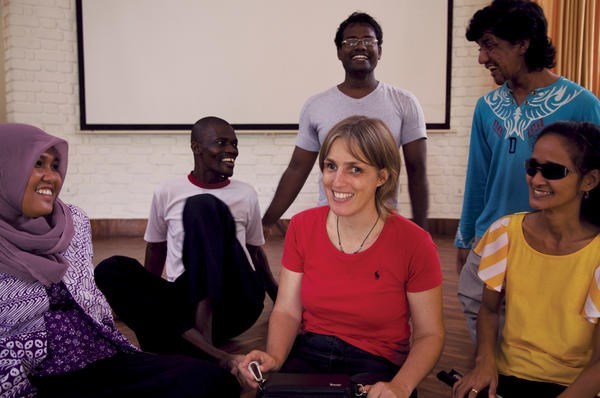 Sabriye Tenberken (c. with red shirt) is surrounded by participants in her kanthari institute course for aspiring social innovators.  <P>Charukesi Ramadurai