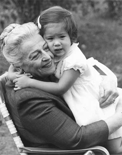 <center>Pearl S. Buck with a Welcome House child in the 1960s.  <br>Photo courtesy of: http://www.en