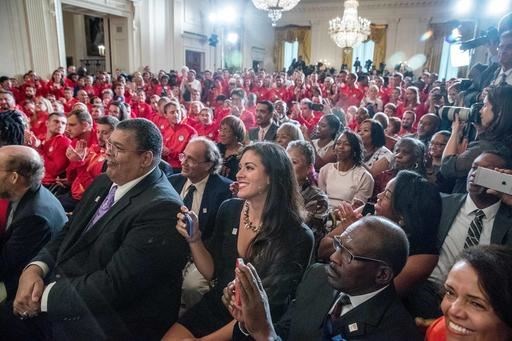 The families of 1936 Summer Olympians, foreground, including the family of four-time Olympic gold medalist Jesse Owens, are recognized as they sit in the audience in the East Room of the White House in Washington, Thursday, Sept. 29, 2016, during a ceremony where President Barack Obama honored the 2016 United States Summer Olympic and Paralympic Teams. (AP Photo/Andrew Harnik)