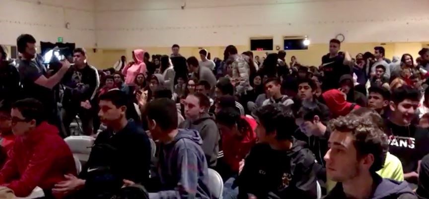 Students at Taft High School listen to Mohamed Sidibay