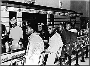 Day 2 of Woolworth Sit-In: (L to R) Joseph McNeil, Franklin McCain, Billy Smith & Clarence Henderson, 02/02/60.<br>Photo by John "Jack" Moebes as it appeared in the Greensboro <i>News and Record</i>