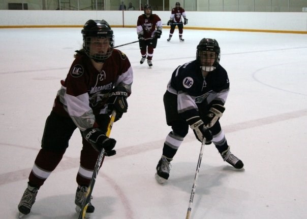 Lindsay playing hockey (Uncle Kelly)