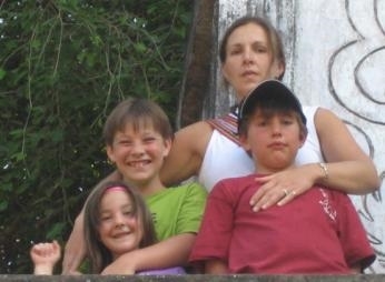 A picture of my mom, sister, brother and me<br>(Our personal collection)