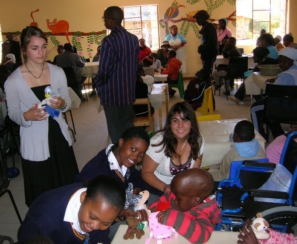 Students presenting toys to disabled children under TOYJOY program<br> (http://ads-gss.blogspot.com/)