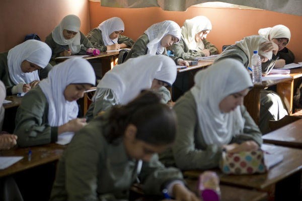 Primary and secondary school girls take a school wide English language test at Al-Redwan Islamic School on November 8, 2012 in the Nasr City district of Cairo, Egypt. <P>(Ann Hermes/The Christian Science Monitor)