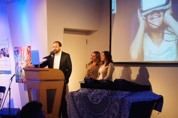 Zeda Stone from Ryot Foundation with Amber Chavez and Kara Noskoff from CHOC Child Life Team accept honors for the Great Escape VR Project for Pediatric Patients.